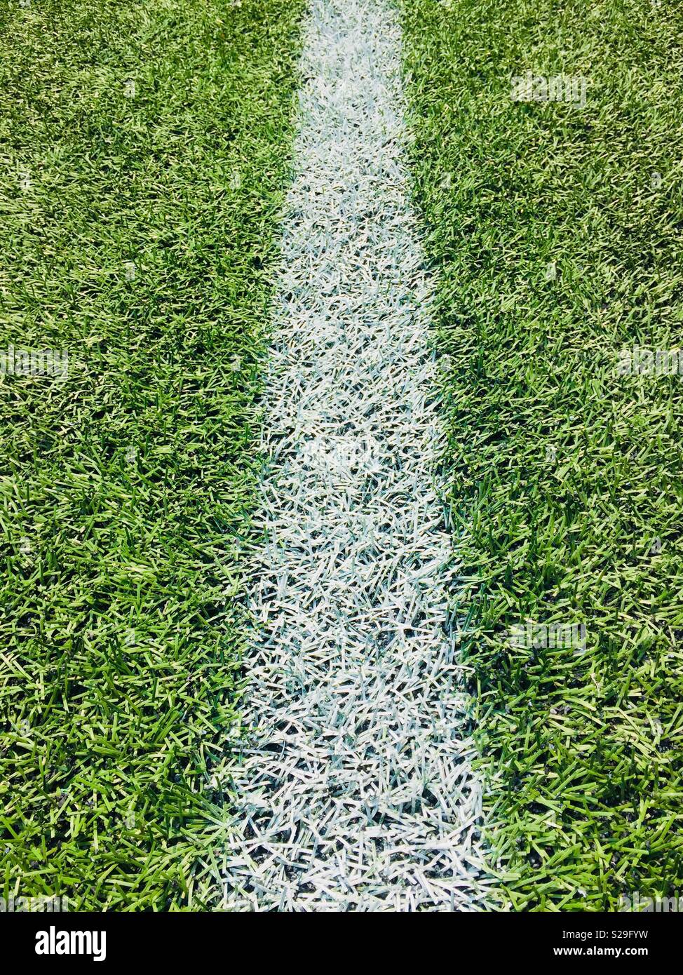 Boundary line on an artificial turf sports field - Smartphone Captured Stock Image