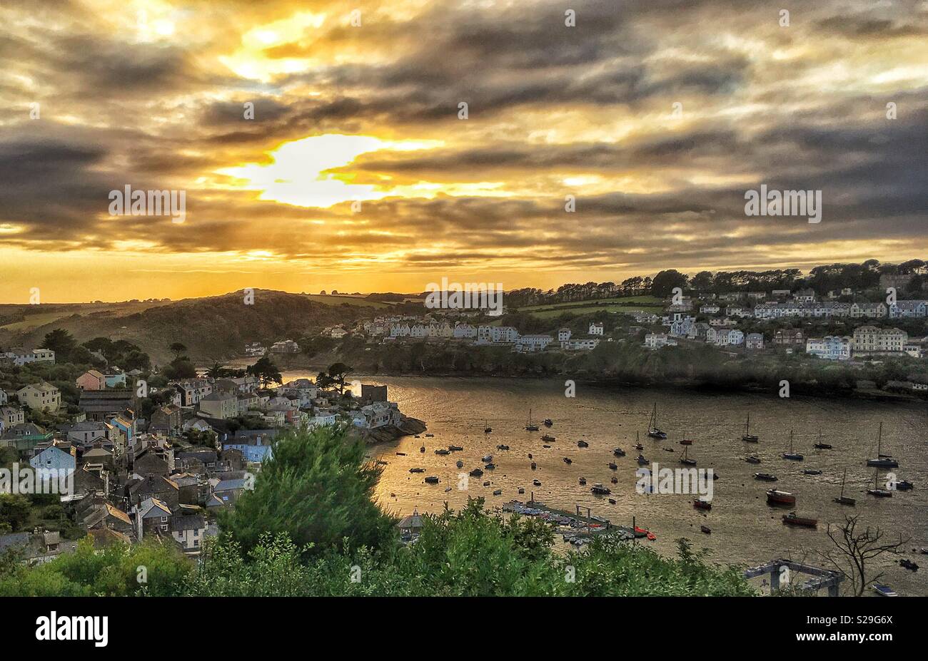 Fowey estuary,Cornwall, UK at sunset on a summer’s evening Stock Photo