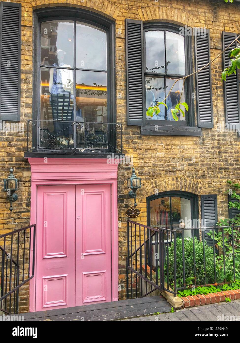 Pink door pops. - Smartphone Captured Stock Image
