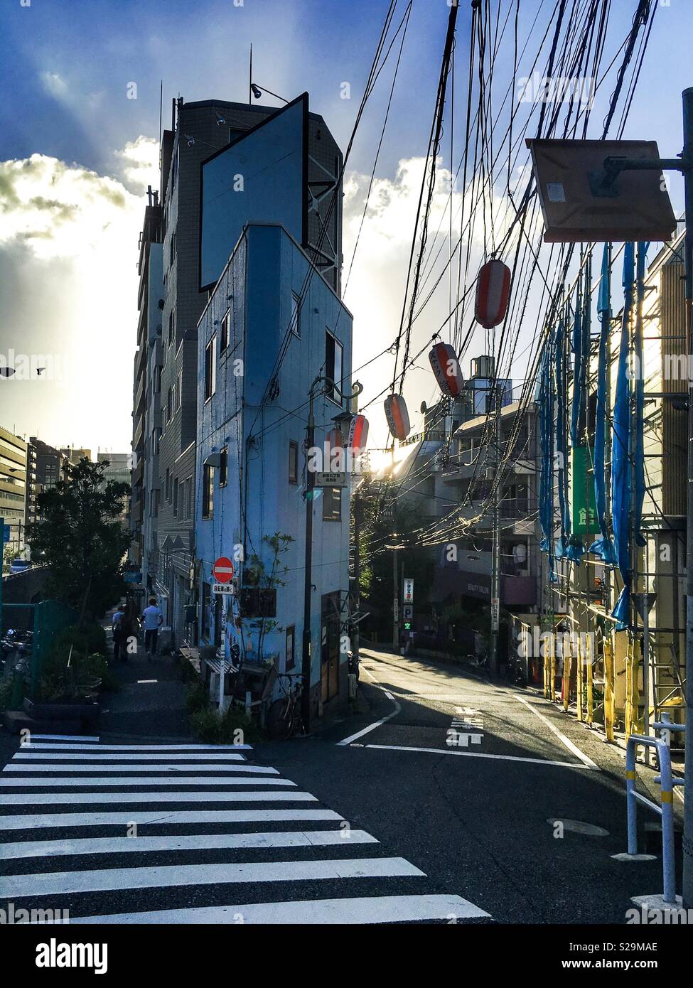 Side Street in Shinjuku city at sunset Stock Photo