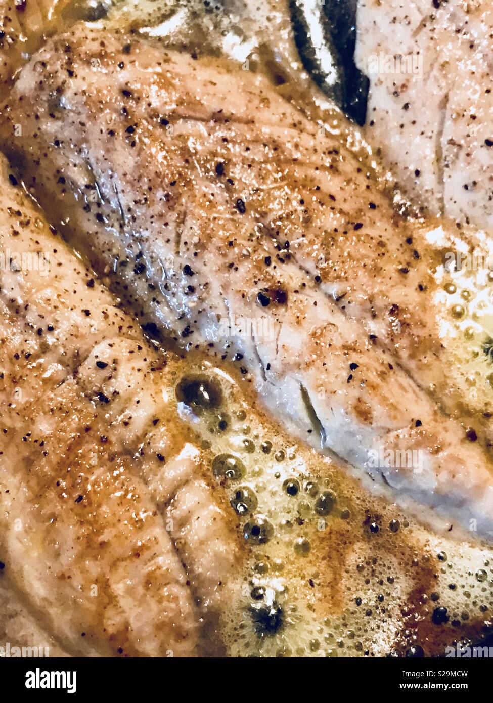 Mackerel in Garlic butter Stock Photo Alamy