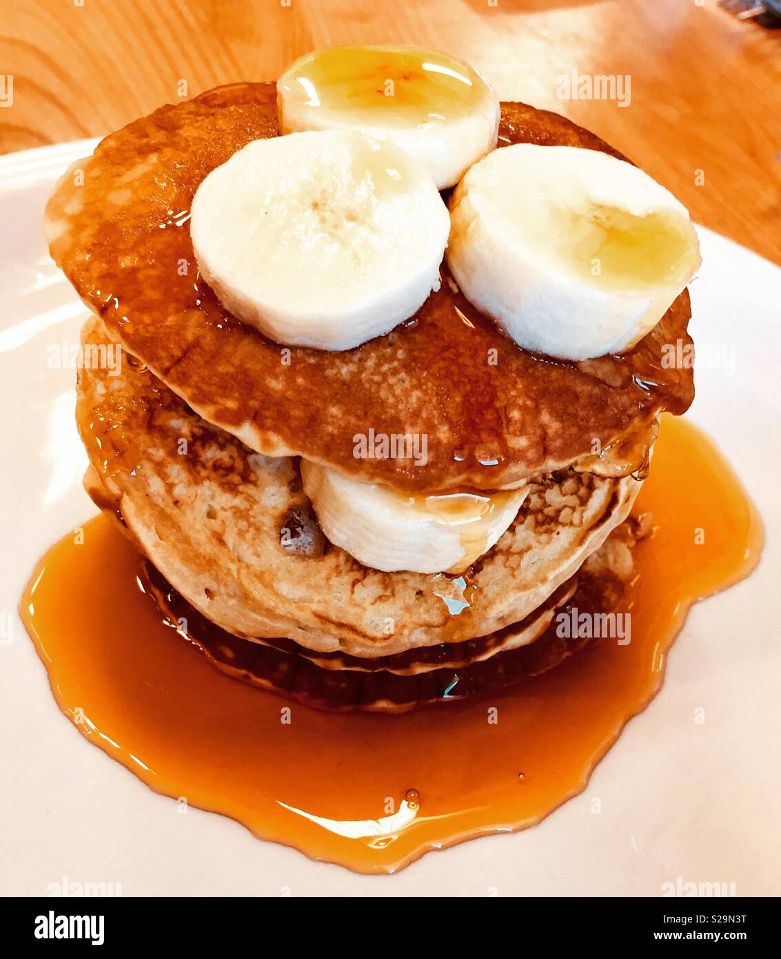 Banana pancakes n syrup Stock Photo Alamy