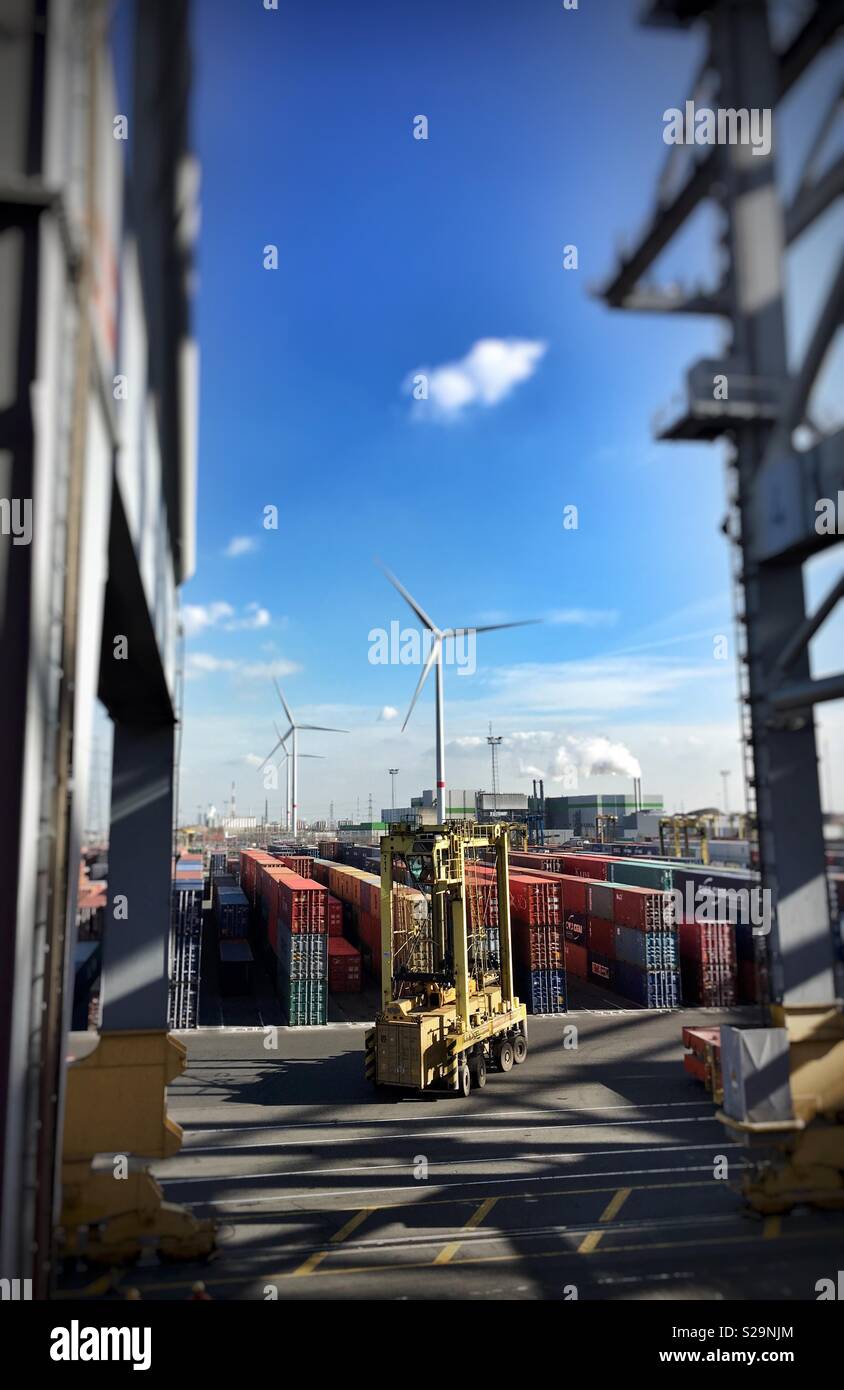 Shuttle carrier for containers in the harbour - Smartphone Captured Stock Image