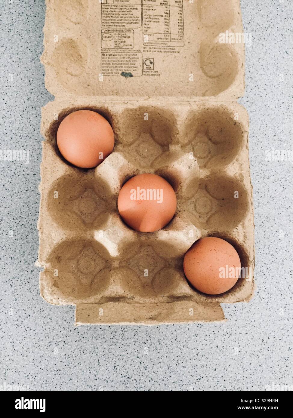 Three eggs in the row Stock Photo