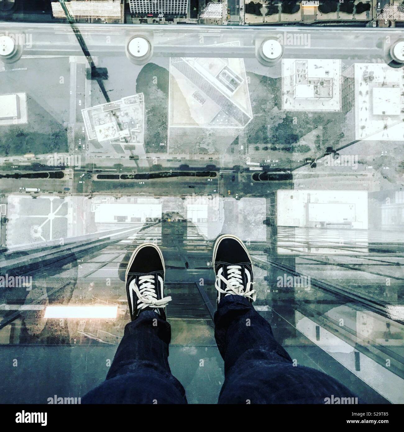 Looking down on the ledge on sky deck of Willis tower Stock Photo