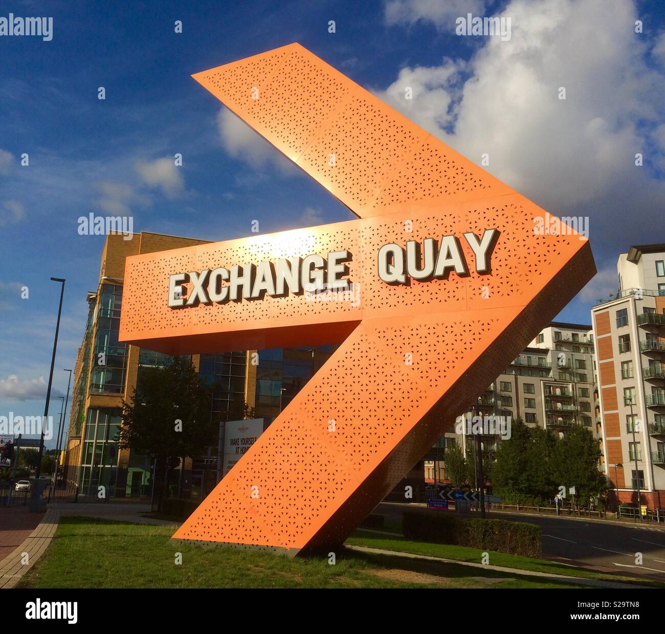 Big orange arrow at Exchange Quay Business Park, Salford Quays Stock Photo