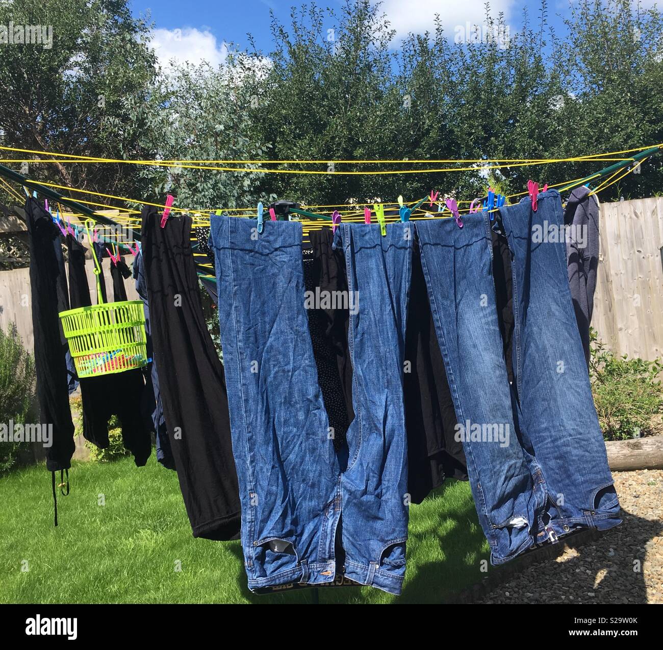 Washing on a rotary clothes line Stock Photo Alamy