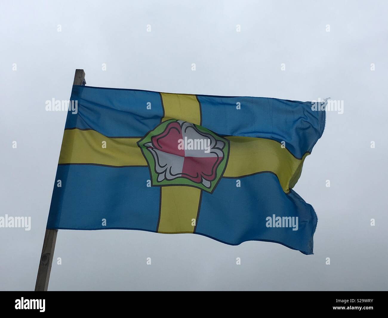 Pembrokeshire flag blowing in the wind in West Wales Stock Photo