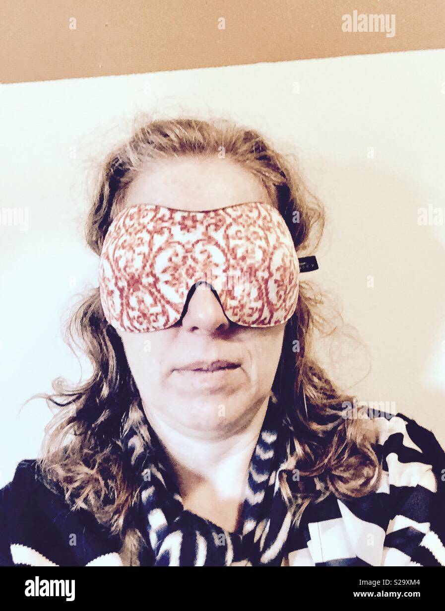 Woman wearing eye mask after eye injury Stock Photo Alamy