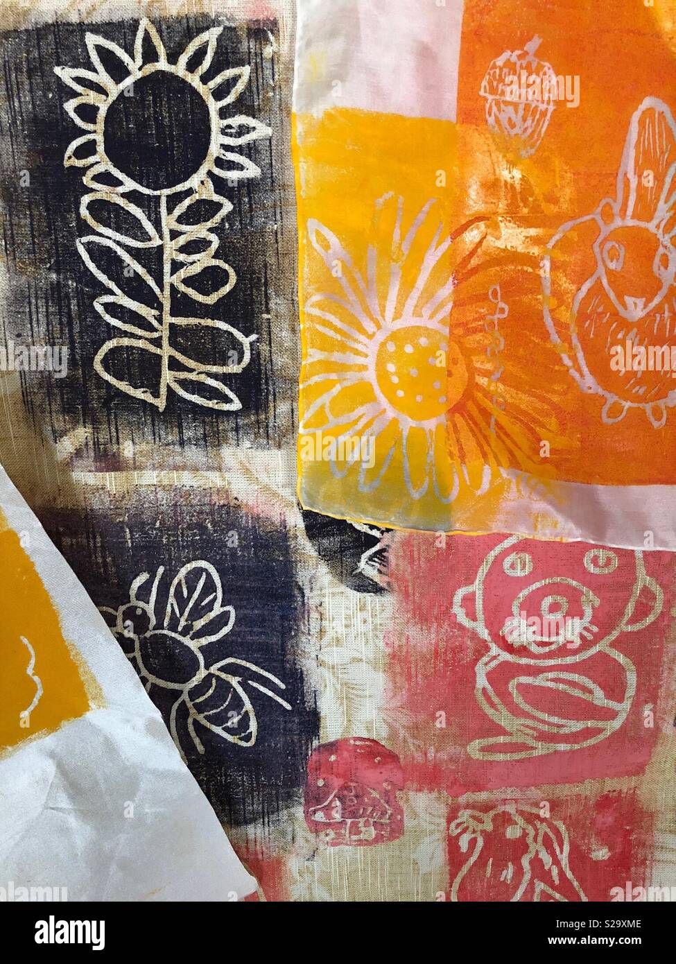 Printed artwork of nature subjects on white fabric - Smartphone Captured Stock Image