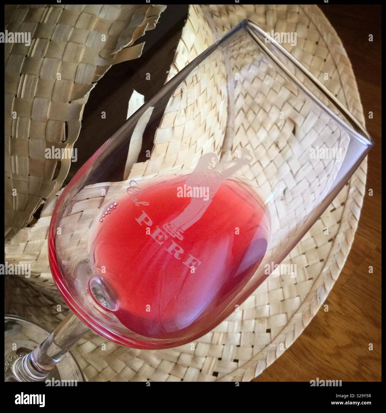 Pre-fermentation sample of Syrah rosé after 2.5 hours skin contact, Catalonia, Spain. - Smartphone Captured Stock Image