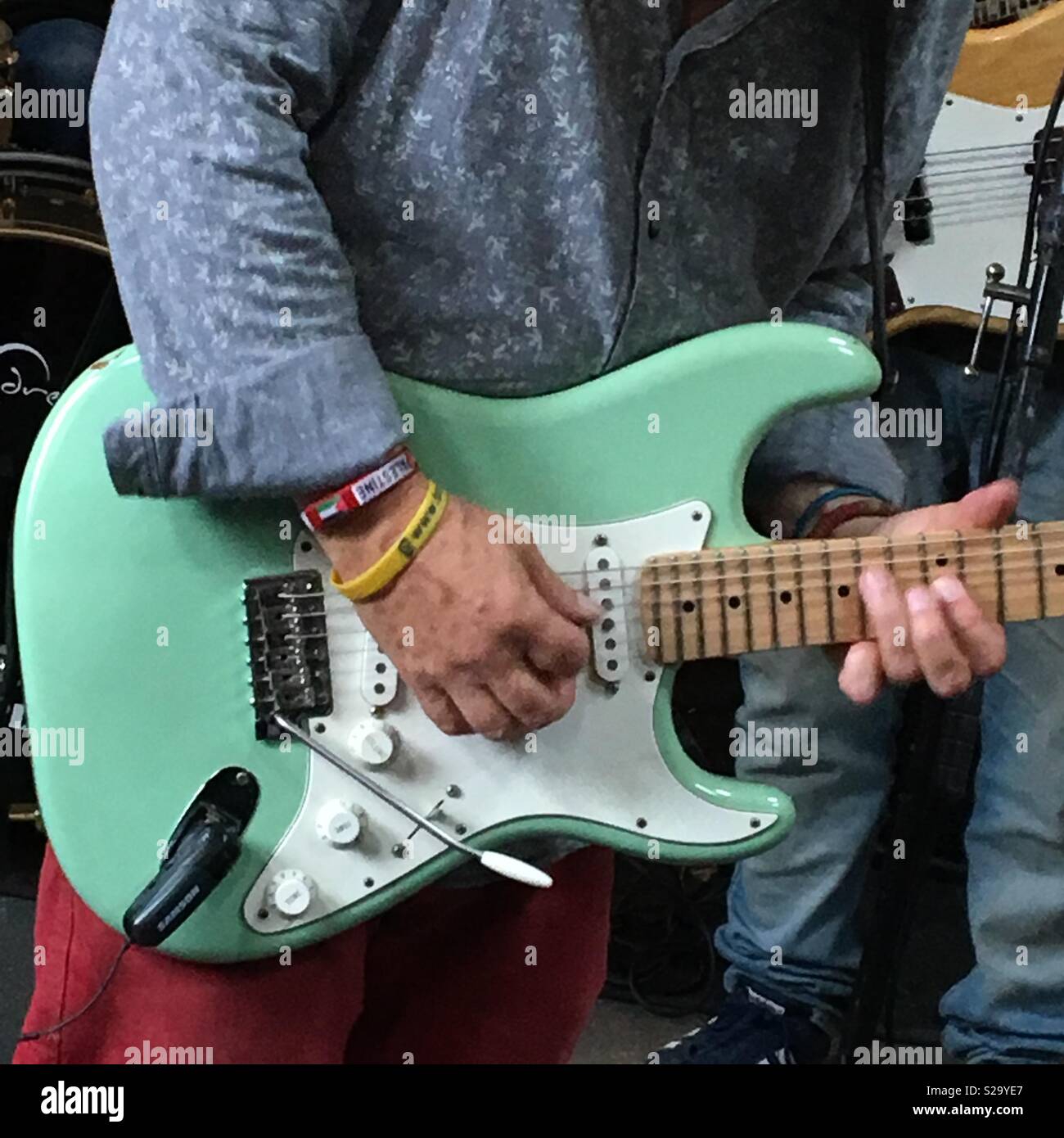 Guitar player - Smartphone Captured Stock Image