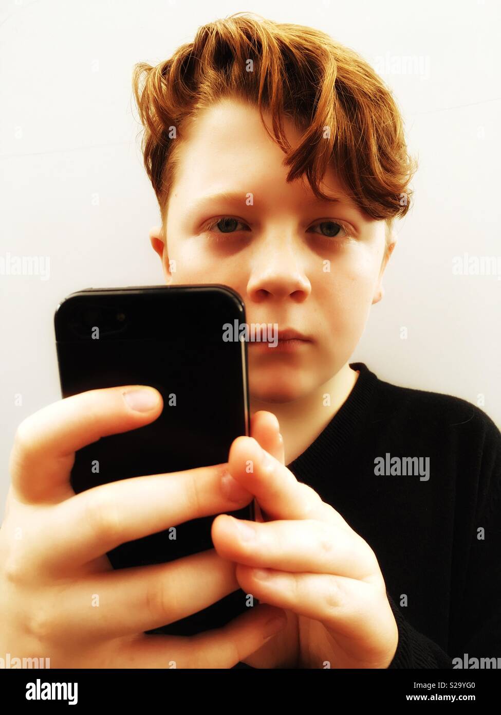 Online addition - Smartphone Captured Stock Image