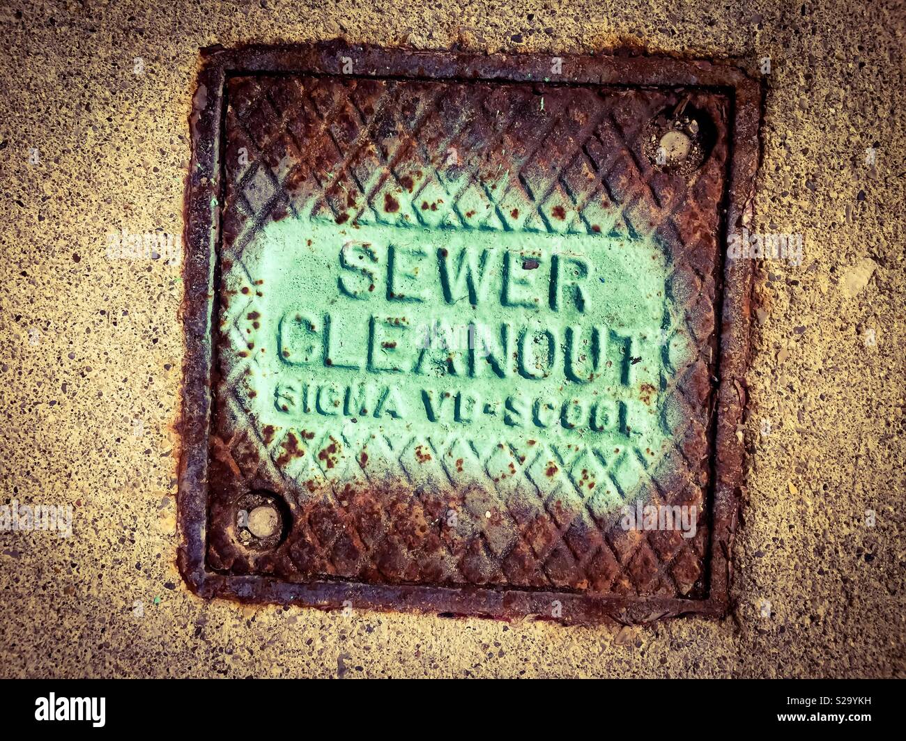 Rusted sewer cleanout - Smartphone Captured Stock Image