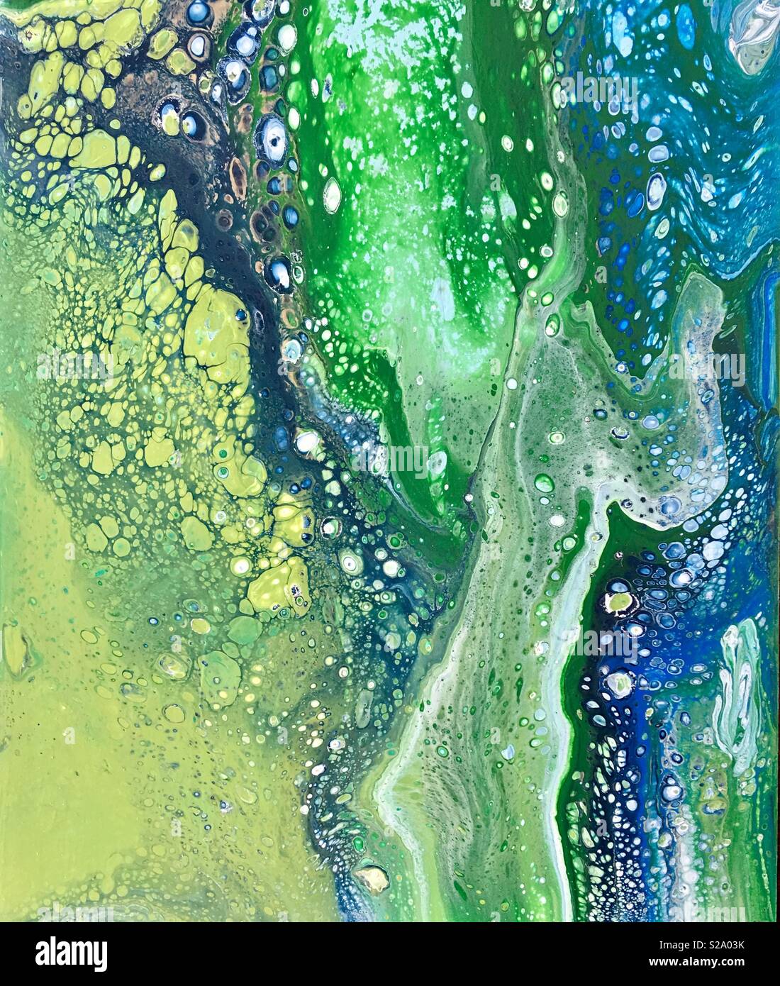 Abstract blue and green paint swirls and bubbles. Painted background