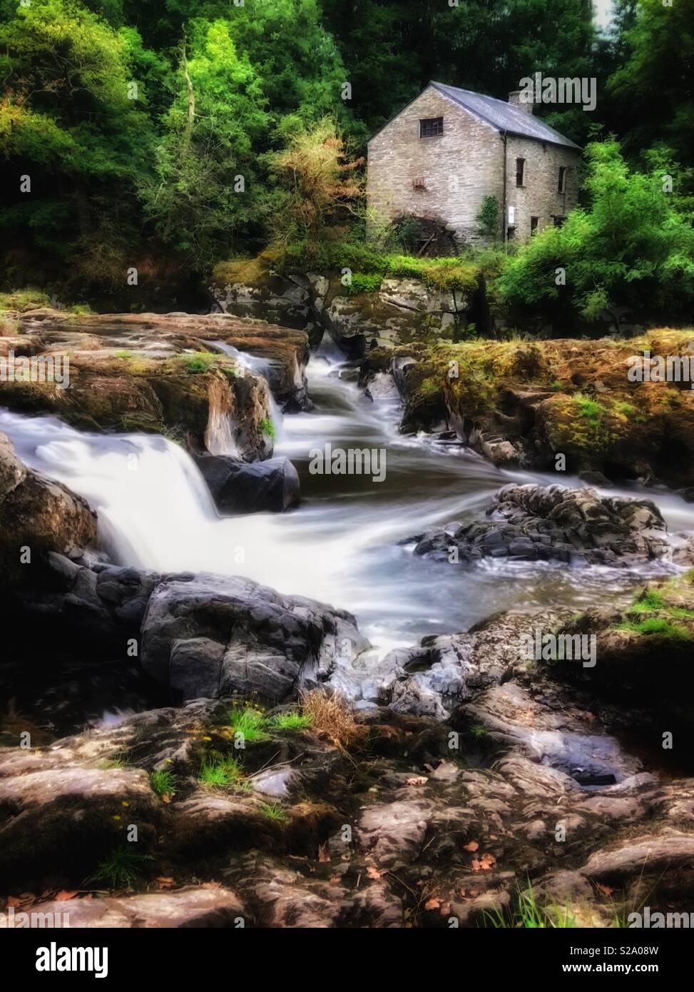 Cenarth falls and the old mill, River Teifi, Cenarth, Ceredigion, West Wales. - Smartphone Captured Stock Image