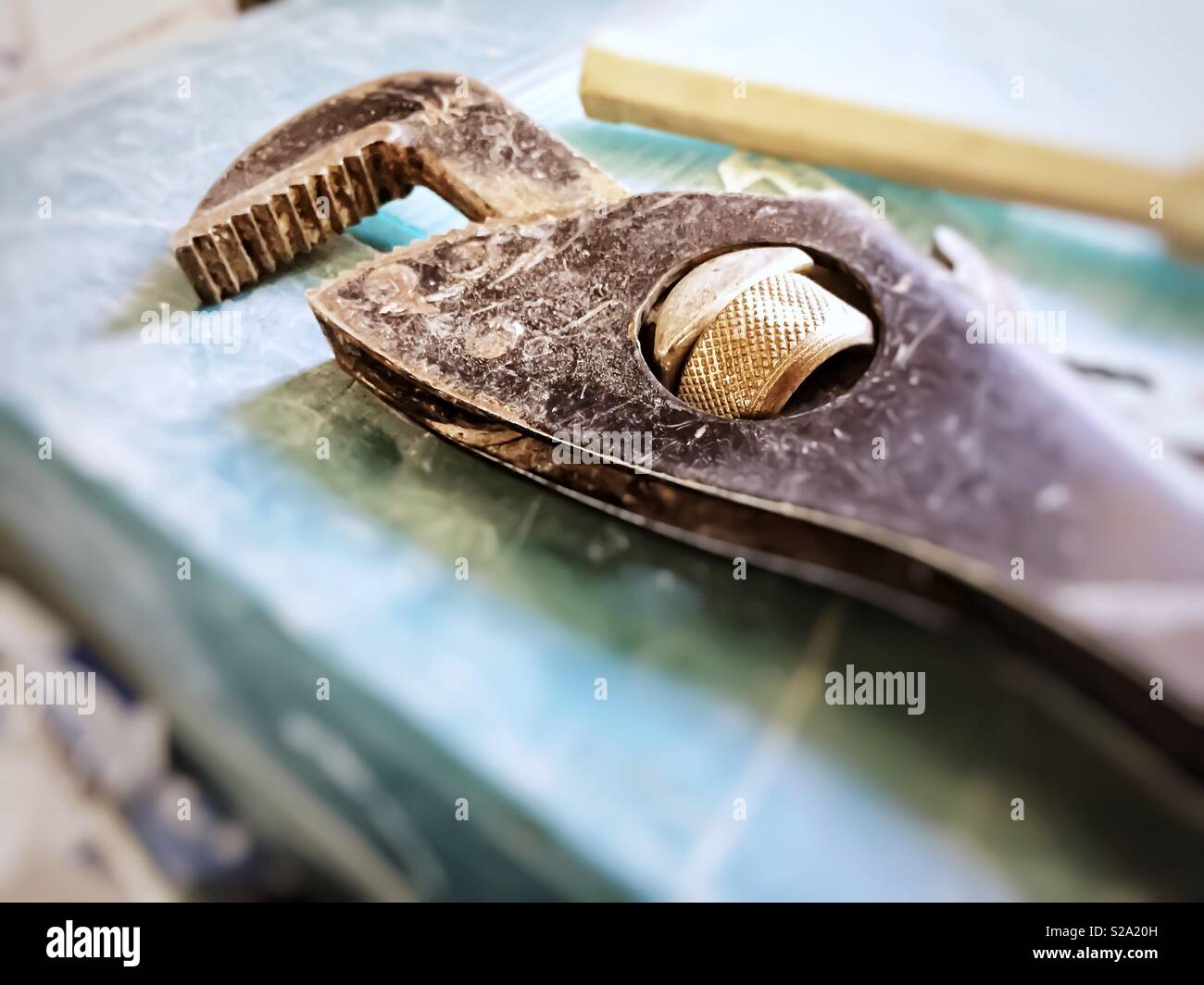 Aged teethy wrench. Repairing work equipment - Smartphone Captured Stock Image