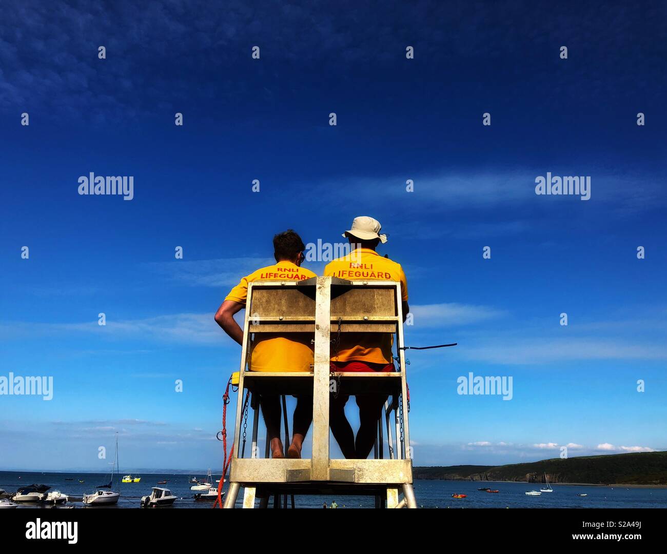 Lifeguards on New Quay beach, Ceredigion, West Wales. - Smartphone Captured Stock Image