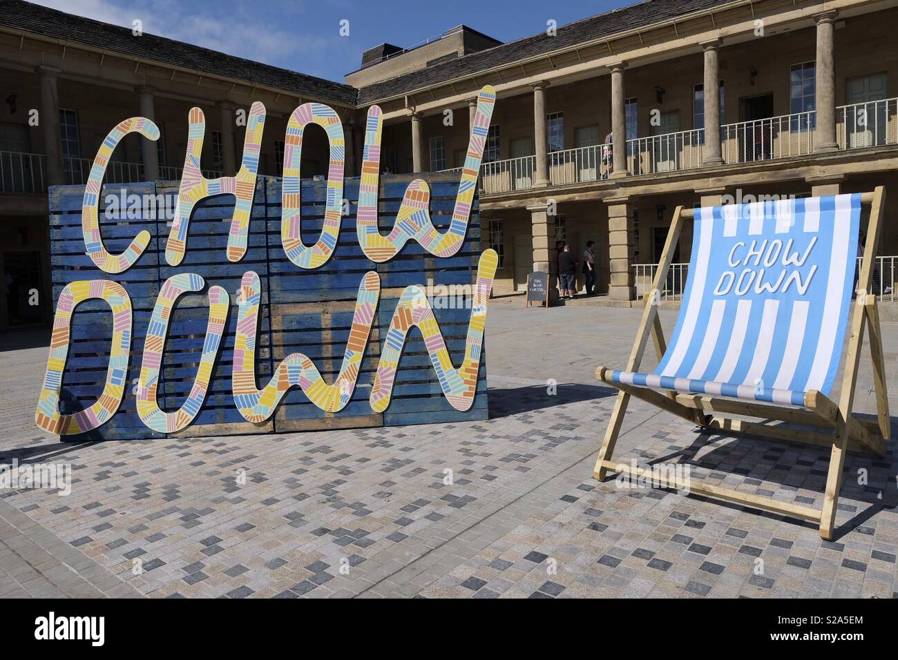 Summer weather at the Chow Down food festival at The Piece Hall, Halifax, West Yorkshire. Stock Photo