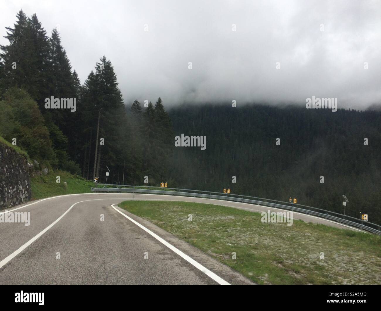 Mountain road on a rainy day. - Smartphone Captured Stock Image