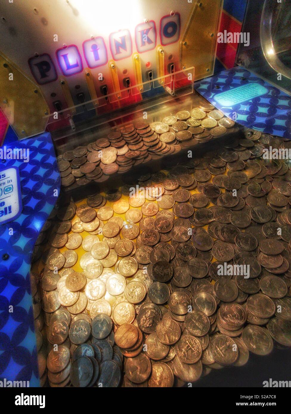 Plinko arcade coin game - Smartphone Captured Stock Image