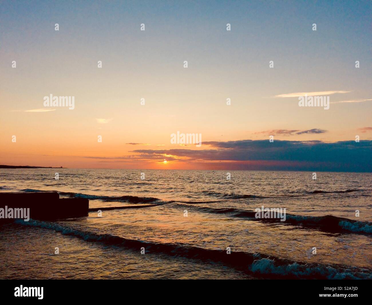 Sunset over beach, Minnis bay, Kent - Smartphone Captured Stock Image