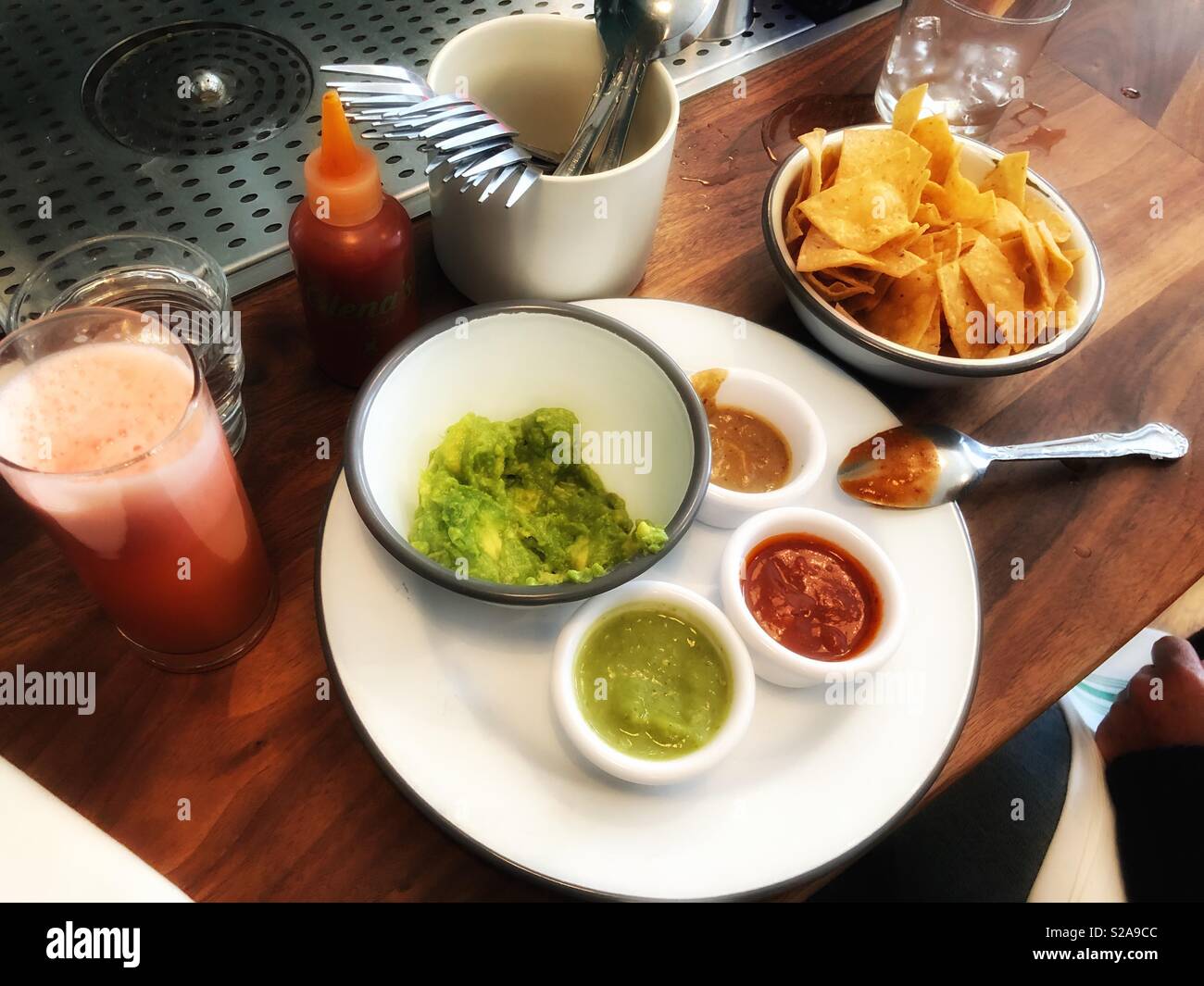 Chips,salsas, and guacamole at Glena’s in San Francisco. - Smartphone Captured Stock Image Chips,salsas, and guacamole at Glena’s in San Francisco. - Smartphone Captured Stock Image