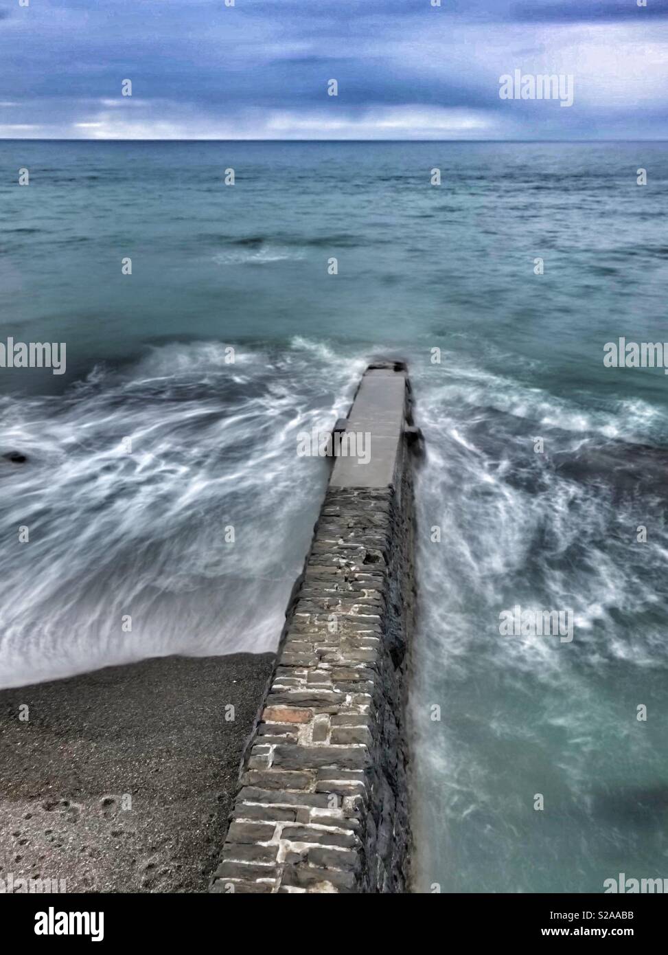 Stone sea breakwater at Aberystwyth, West Wales - Smartphone Captured Stock Image