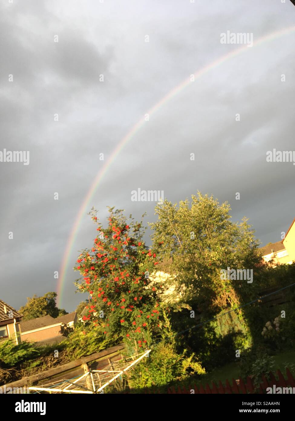 Rainbow and dark clouds hi-res stock photography and images - Alamy