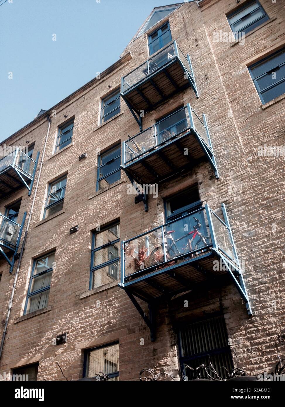 Old mill turned into apartments in Sowerby Bridge West Yorkshire UK Stock Photo