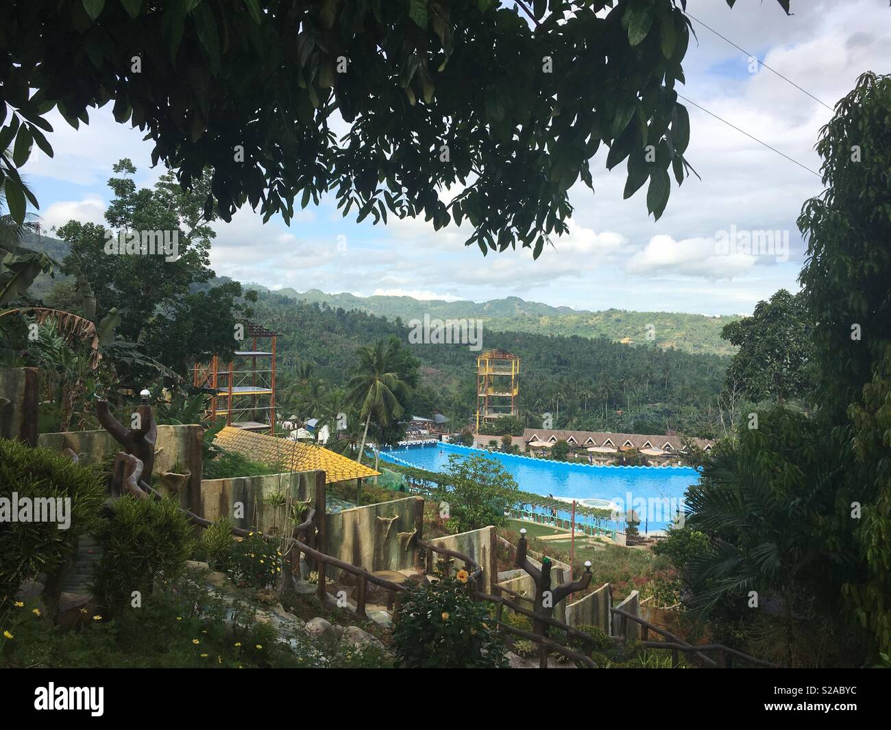 Swimming pool beside cottages - Smartphone Captured Stock Image