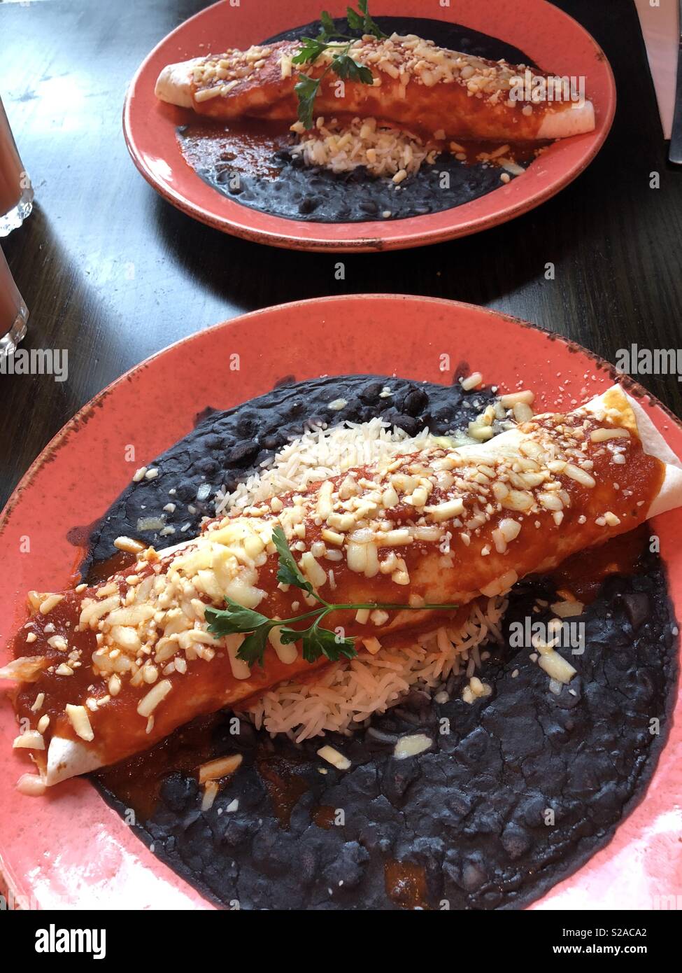 Chicken dish in las iguanas Stock Photo Alamy