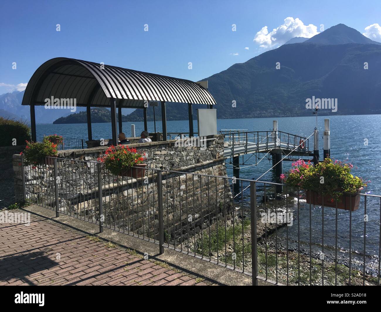 Pianello del Lario, Italy - September 8, 2018: lake pier Stock Photo