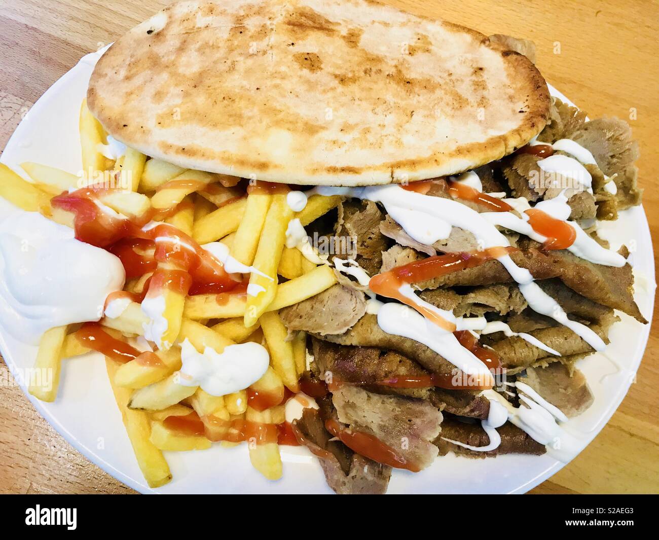 Doner kebab chips hi-res stock photography and images - Alamy