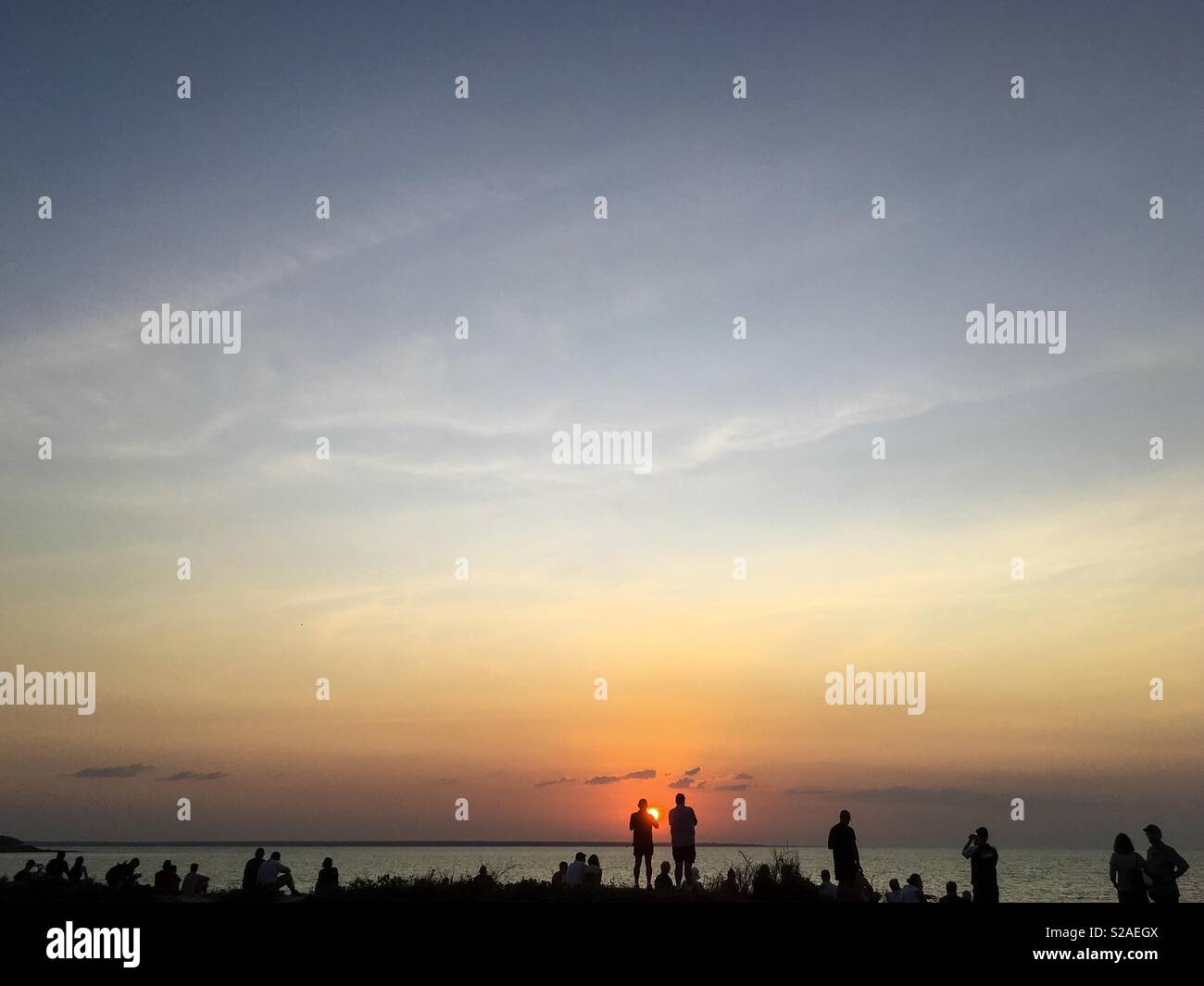 People watching the sunset at Mindil Beach in Darwin, Northern Territory, Australia. - Smartphone Captured Stock Image