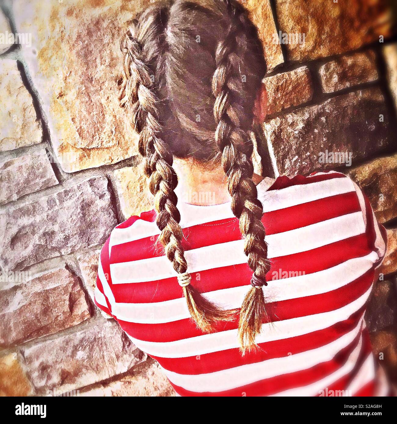 Beautiful Teen Age Girl Wearing Two French Braids In Her Hair And