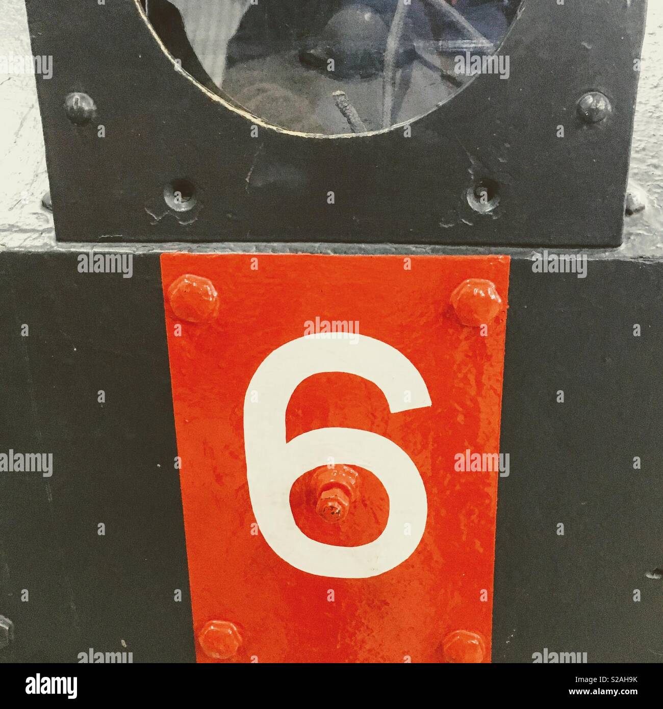 Number 6 painted onto military vehicle Stock Photo