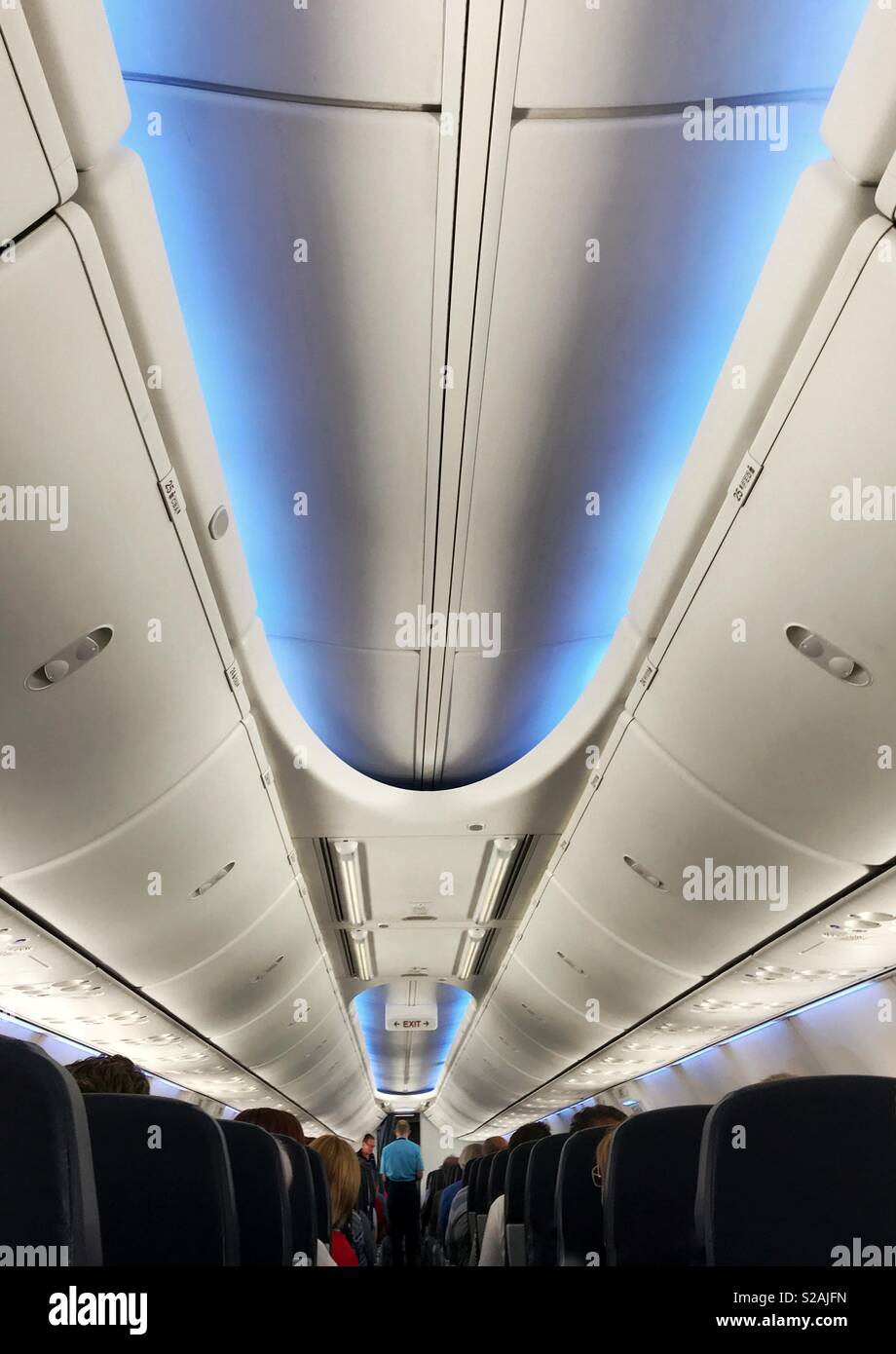 Interior lighting and decor of a TUI Boeing 737 jet - Smartphone Captured Stock Image