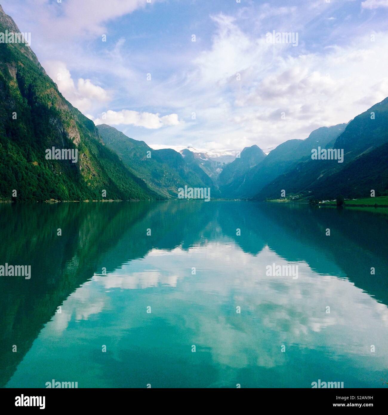 Reflections in a Norwegian fjord Stock Photo