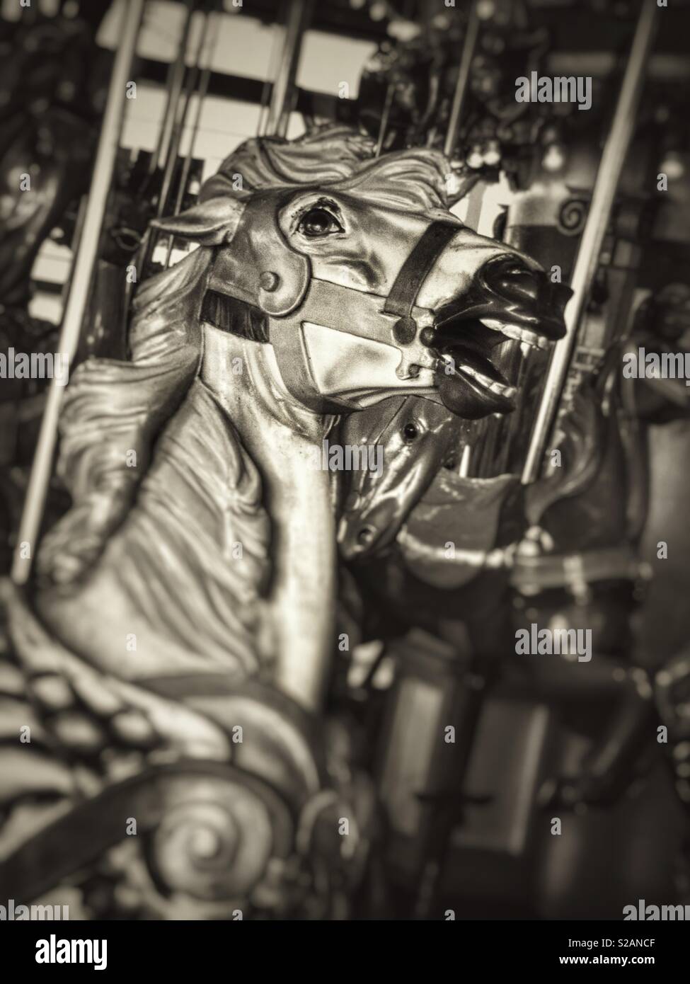 Sepia toned closeup of a carousel horse - Smartphone Captured Stock Image