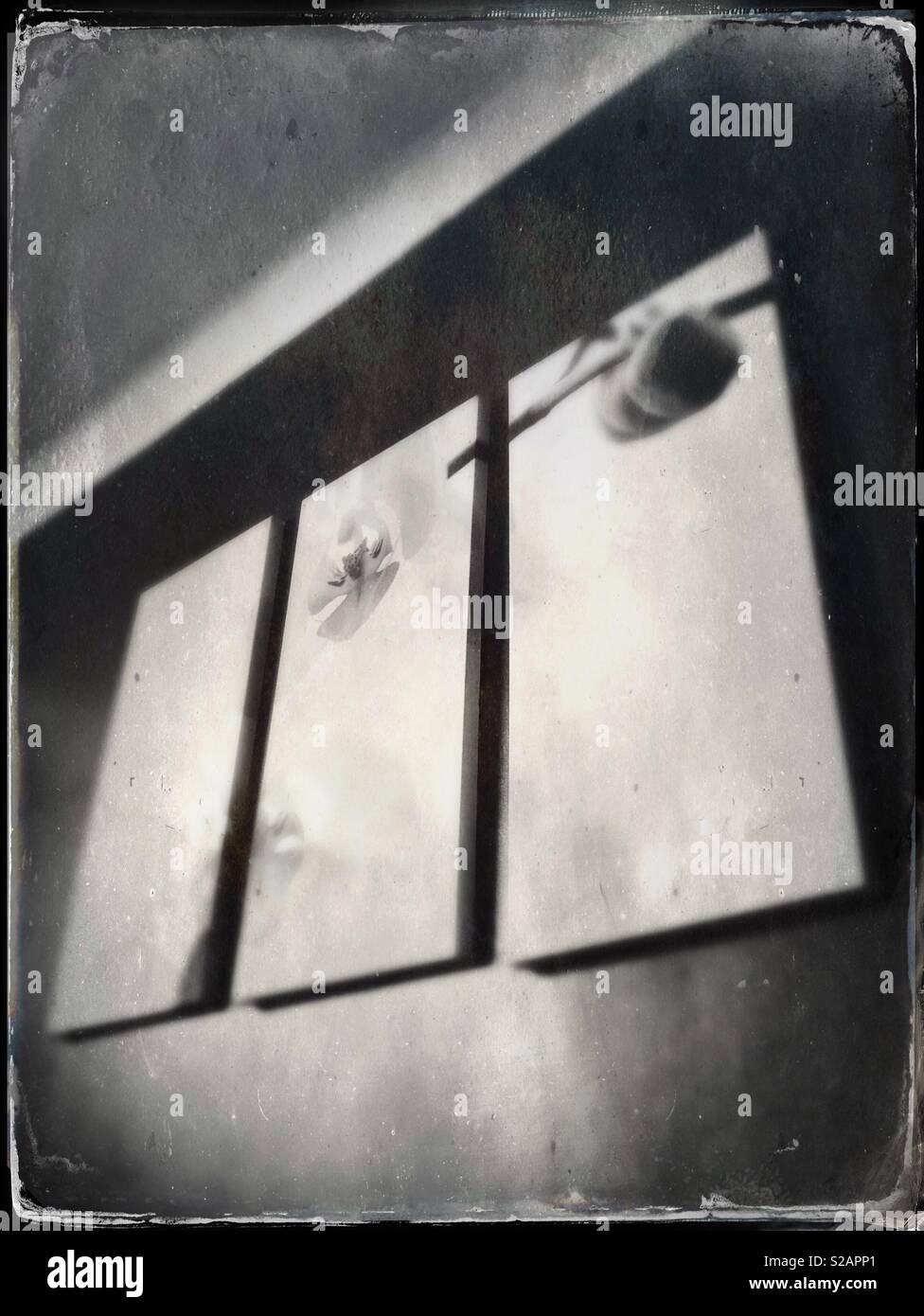 Three piece art on bedroom wall Stock Photo - Alamy