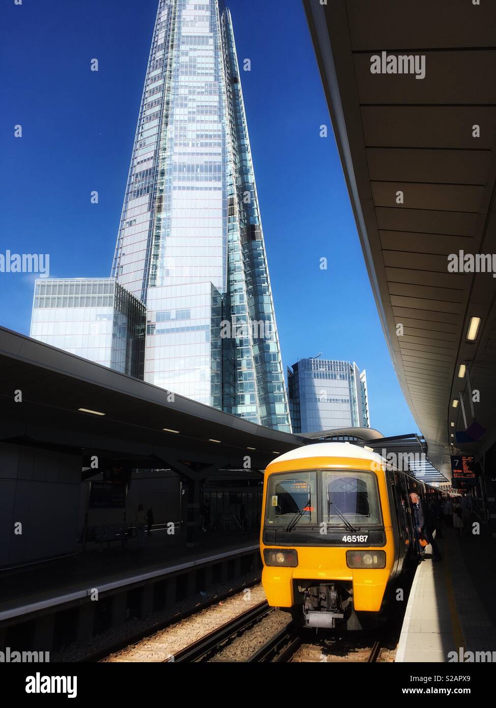 A train approaching a platform at London Bridge station in England - Smartphone Captured Stock Image