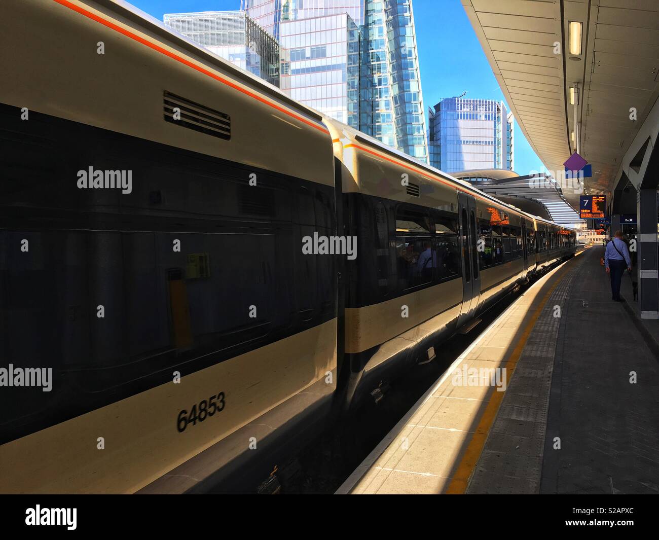 A train approaching a platform at London Bridge station in England - Smartphone Captured Stock Image
