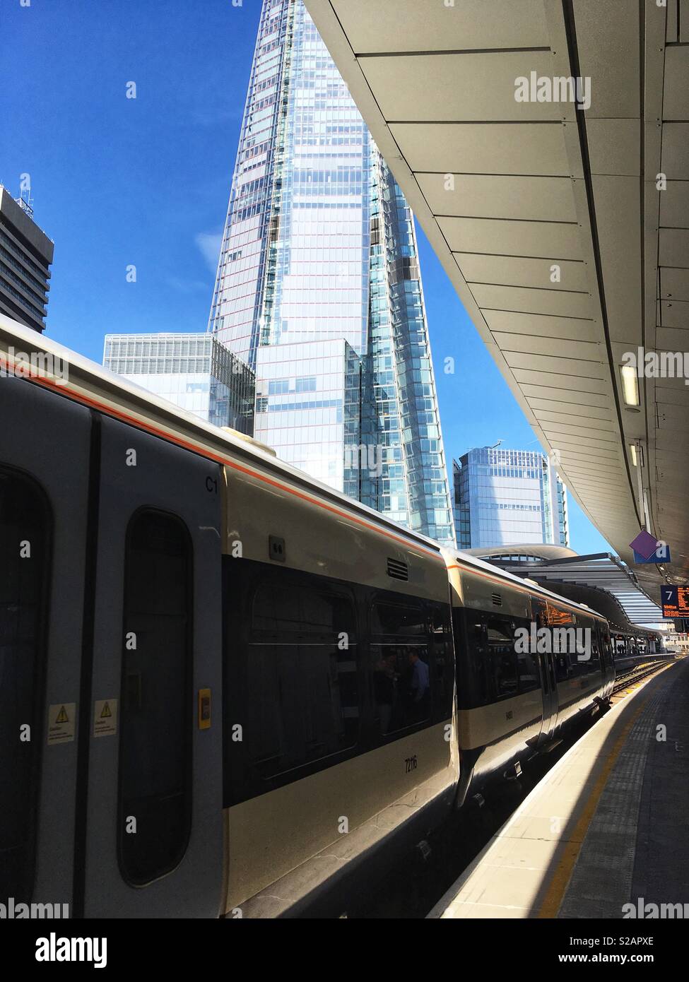A train approaching a platform at London Bridge station in England - Smartphone Captured Stock Image
