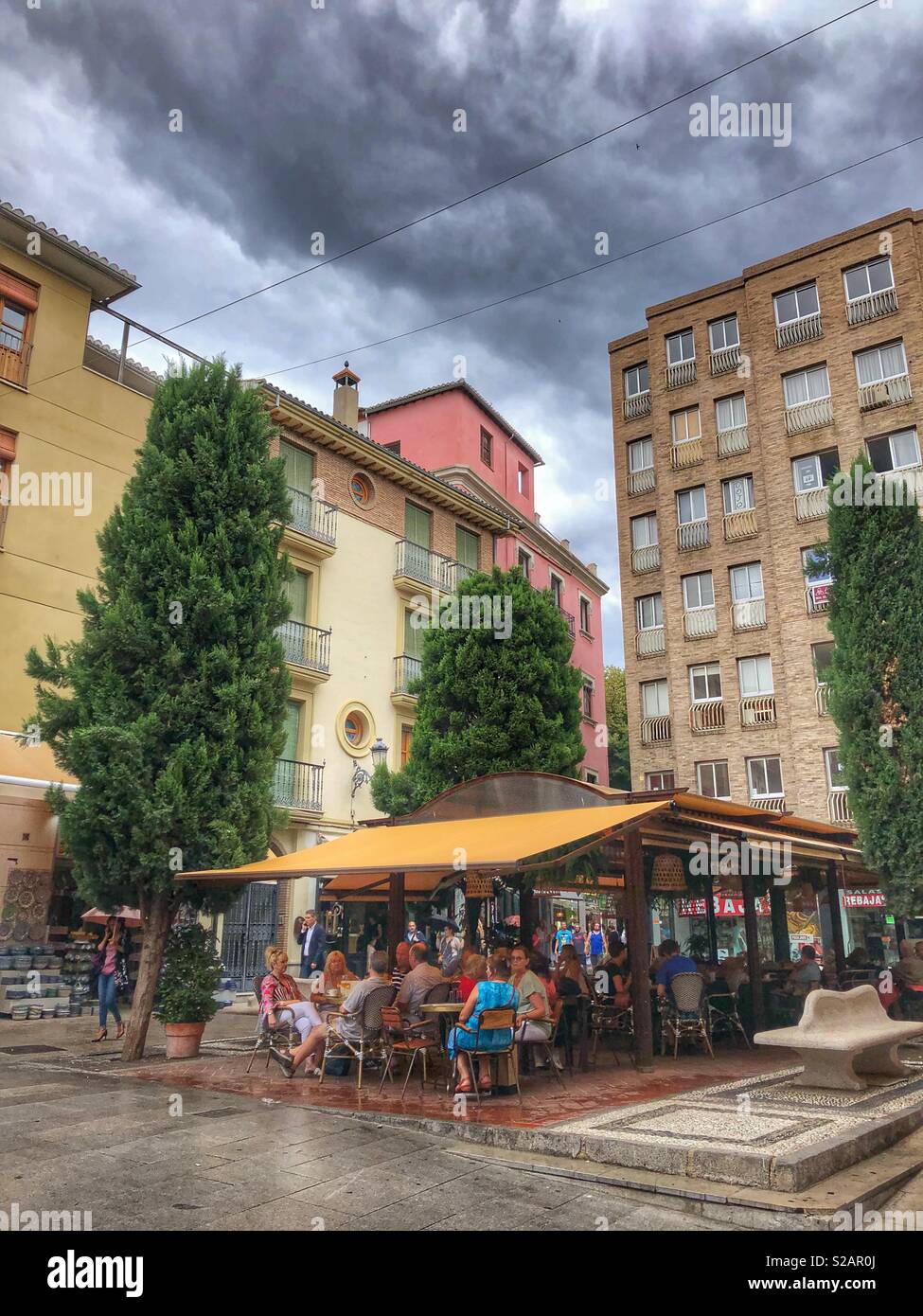 A cozy plaza in Granada, Spain. - Smartphone Captured Stock Image