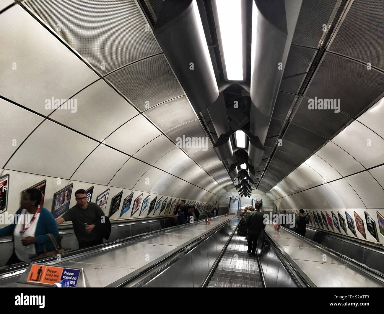 Escalators going down at London Bridge Underground station in England on September 15 2018 - Smartphone Captured Stock Image