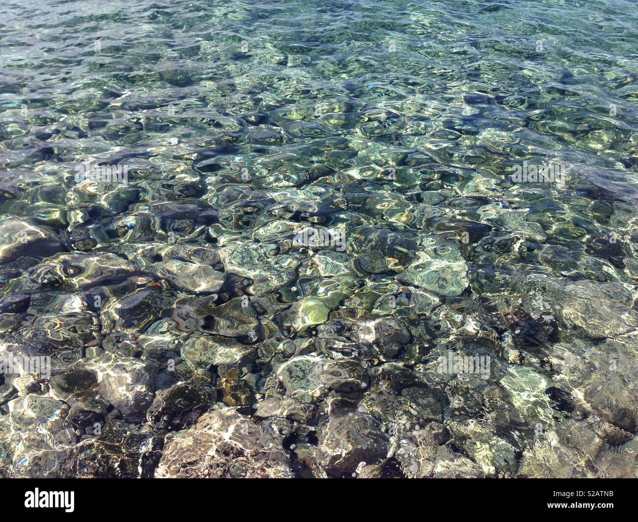 Translucent Water With Rocks Water and rocks hi-res stock photography and images - Alamy