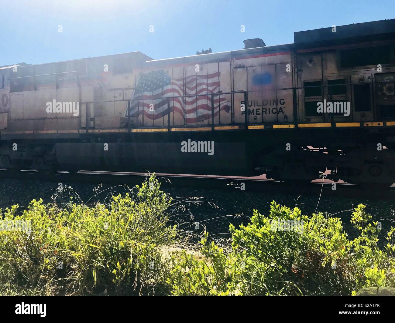 Building American making it great - Bright yellow train with the ...