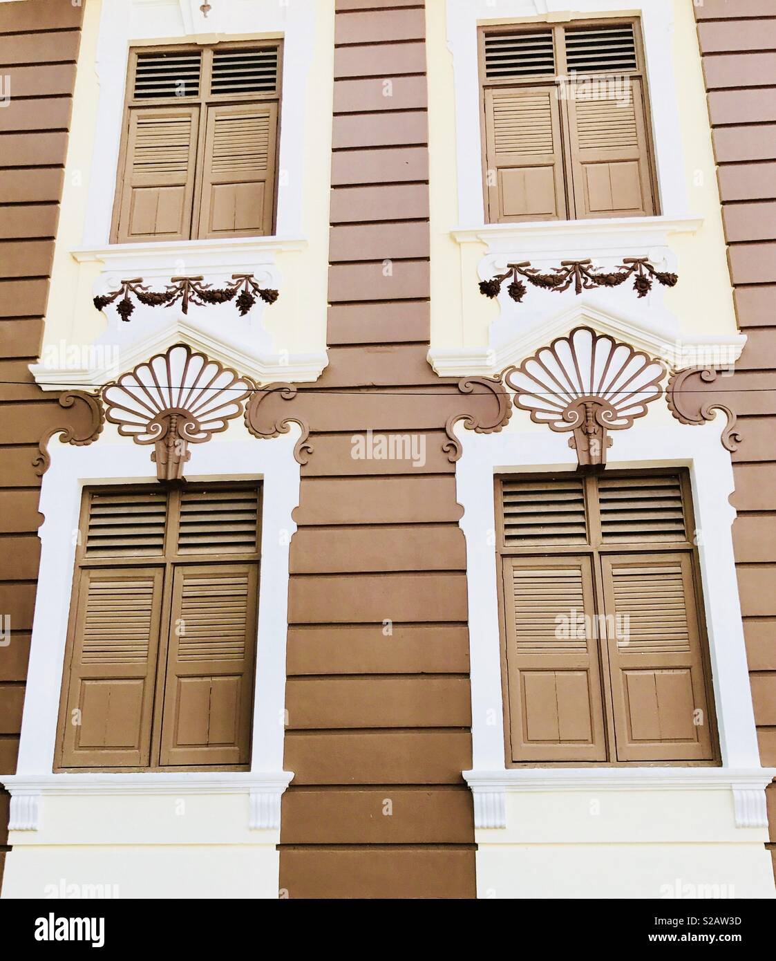Brown painted windows with white frame Stock Photo