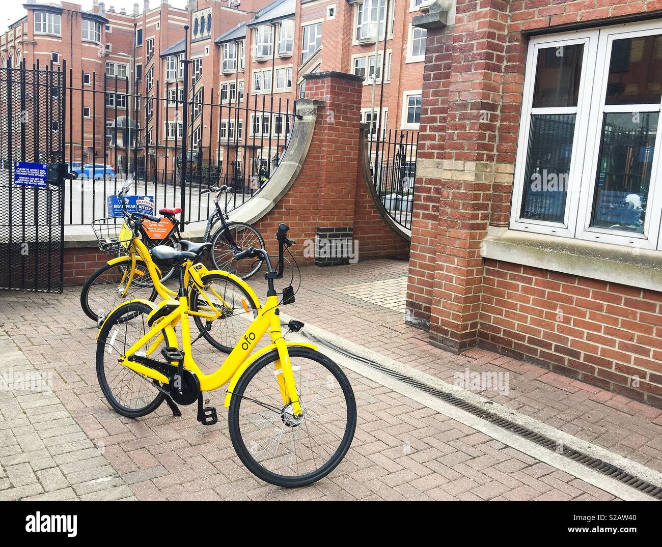Ofo bikes waiting for hire in Gloucester Green, Oxford - Smartphone Captured Stock Image